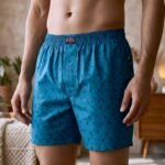 A green blue colour base with a bird print